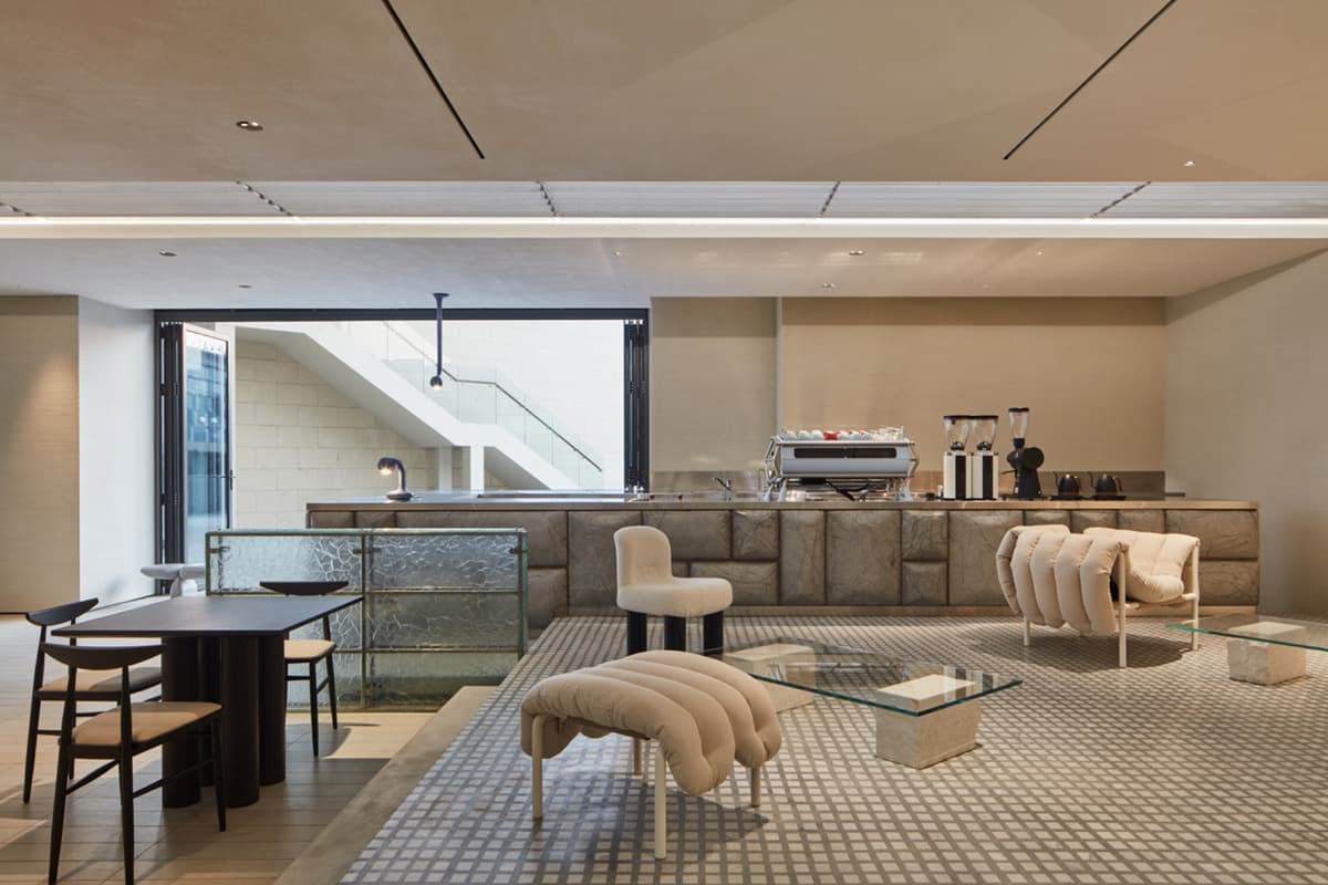 Pillow-quilted stone coffee bar with cracked-glass counter