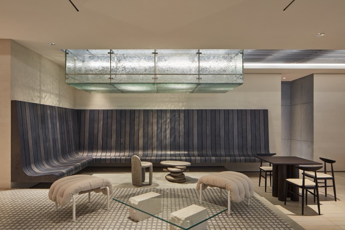 Lounge corner with pillow benches and pebble tables